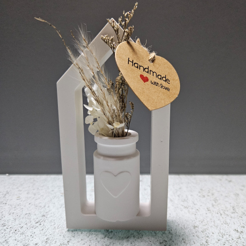 Haus mit Milchkanne